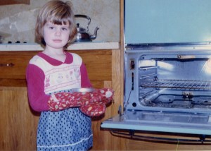 A young cook in the kitchen.
