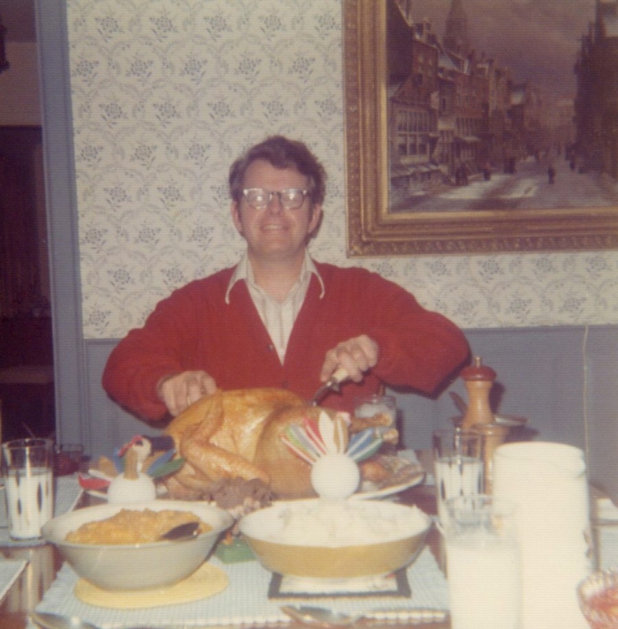 "Dad carving the turkey"