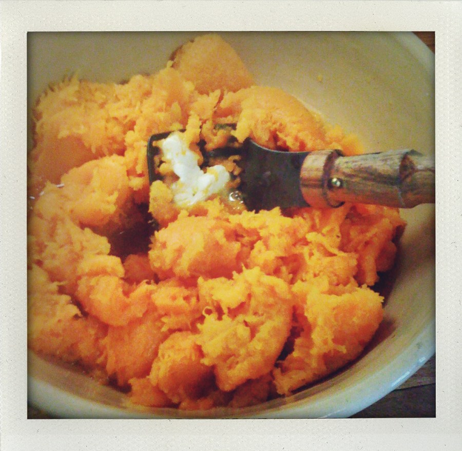 "mashing butternut squash"