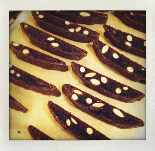 "parchment paper beneath biscotti"
