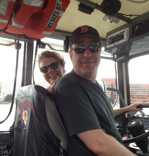 "Heather & Paul driving the duck boat"
