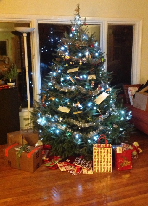 "christmas tree with duct tape wrapped presents"