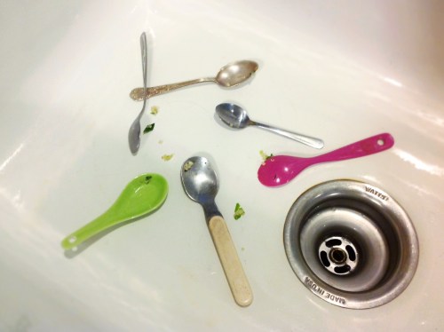 small tasting spoons in sink