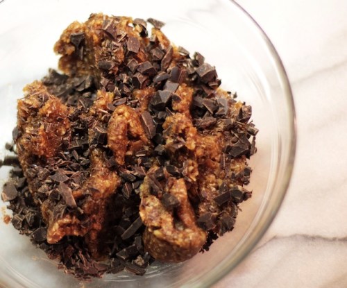 Chopped chocolate added to pumpkin date nut balls