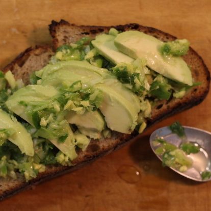 Avacodo toast with green sauce made of ginger, scallions and avocodo oil