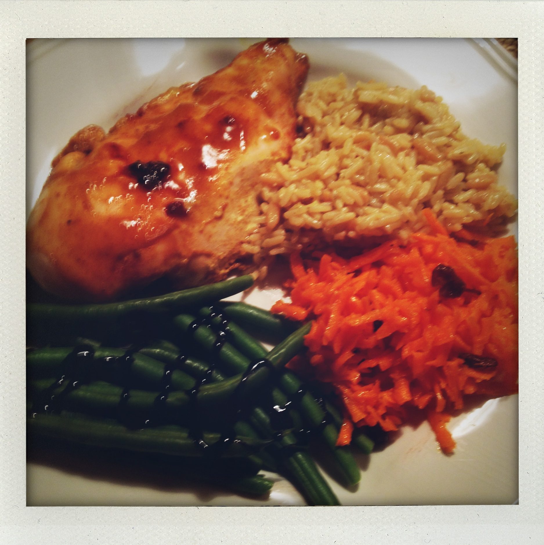 "Honey mustard chicken with green beans, carrot rappes salad and rice pilaf"